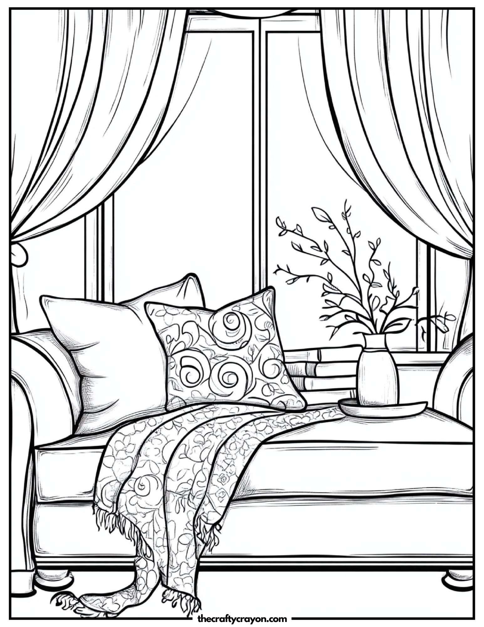 Elegant window nook with pillows and blanket